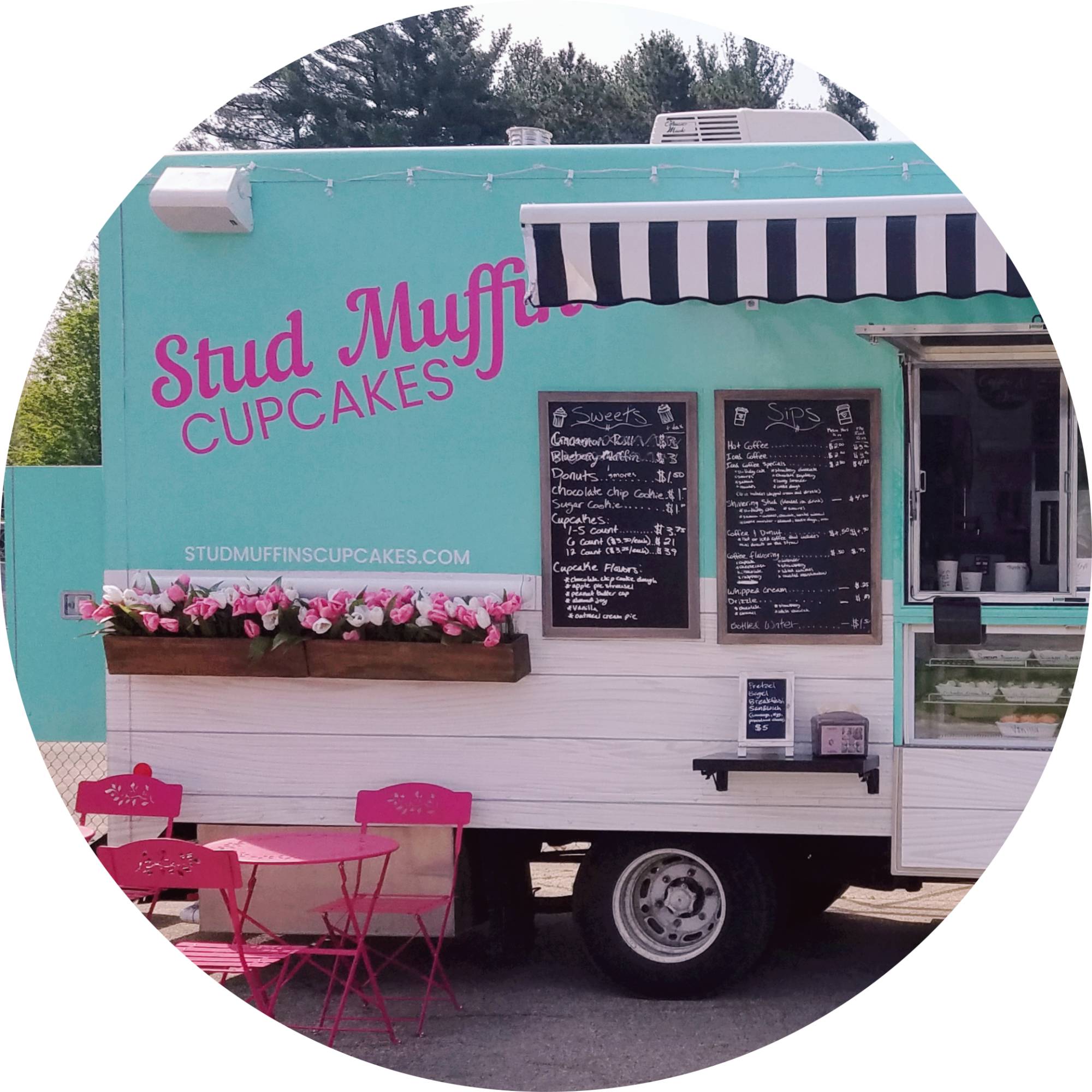 Stud Muffin's Cupcakes food truck with a small flower box on the side and two chalkboard menus